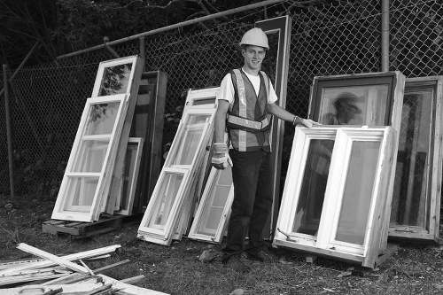 Construction site managing waste disposal in Crouch End