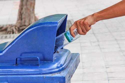 Waste being loaded into a skip for efficient disposal