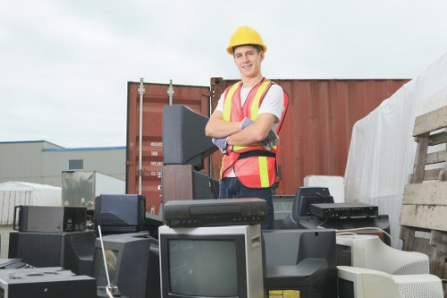 Workers processing recyclable materials at a Crouch End facility